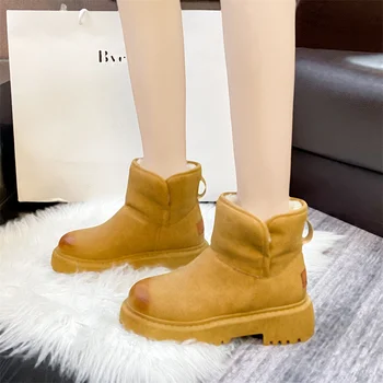 Botas de nieve impermeables para mujer zapatos cálidos de felpa против plataforma botines de piel de cabeza redonda invierno 2021